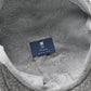 (Grau) Schiebermütze Tweed – Innenseite mit Prince Bowtie Label