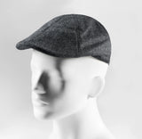 (Anthrazit) Schiebermütze Herren Tweed Flat Cap – Seitenansicht auf Mannequin