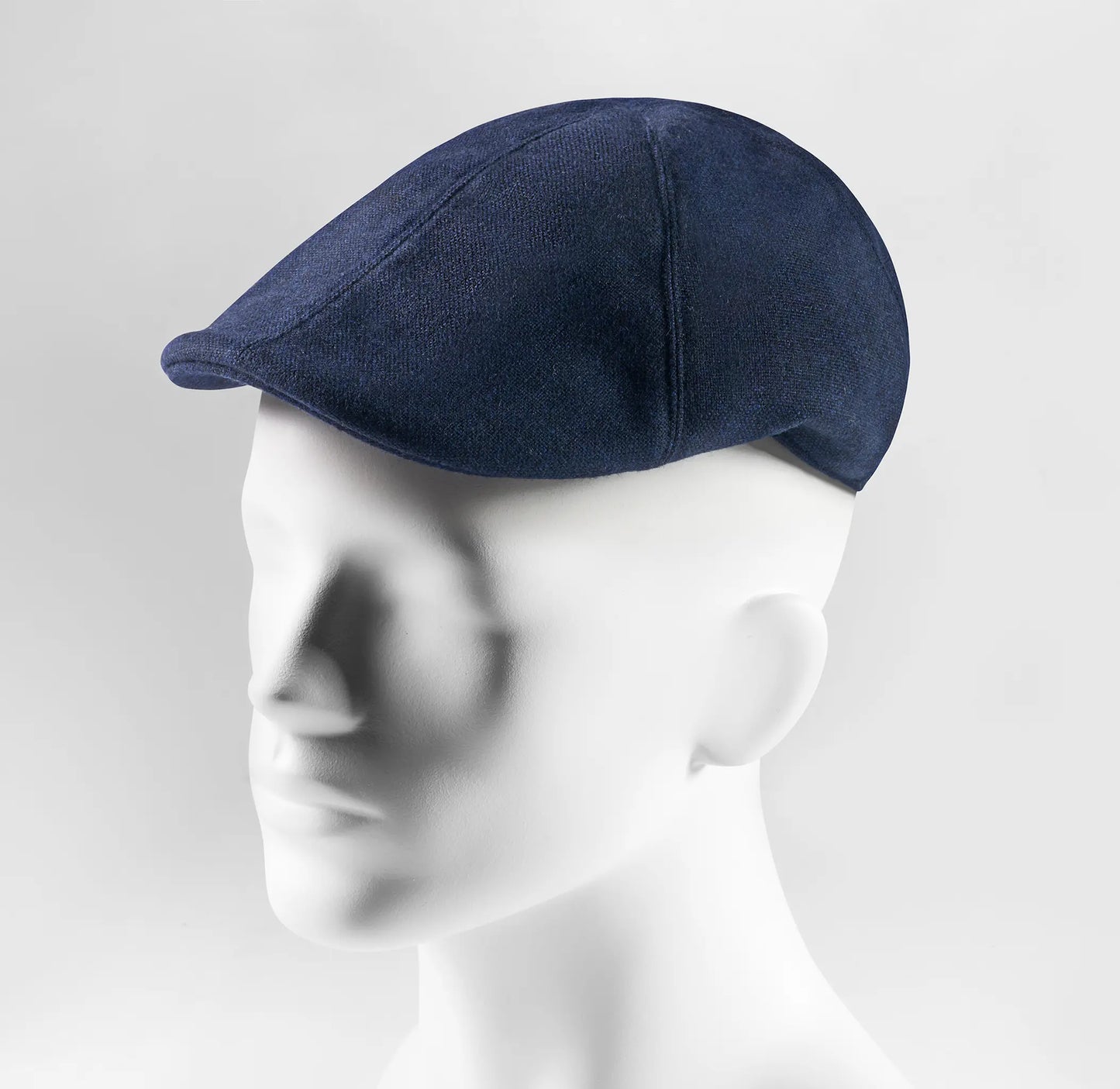 (Dunkelblau) Schiebermütze Herren Tweed Flat Cap – Seitenansicht auf Mannequin