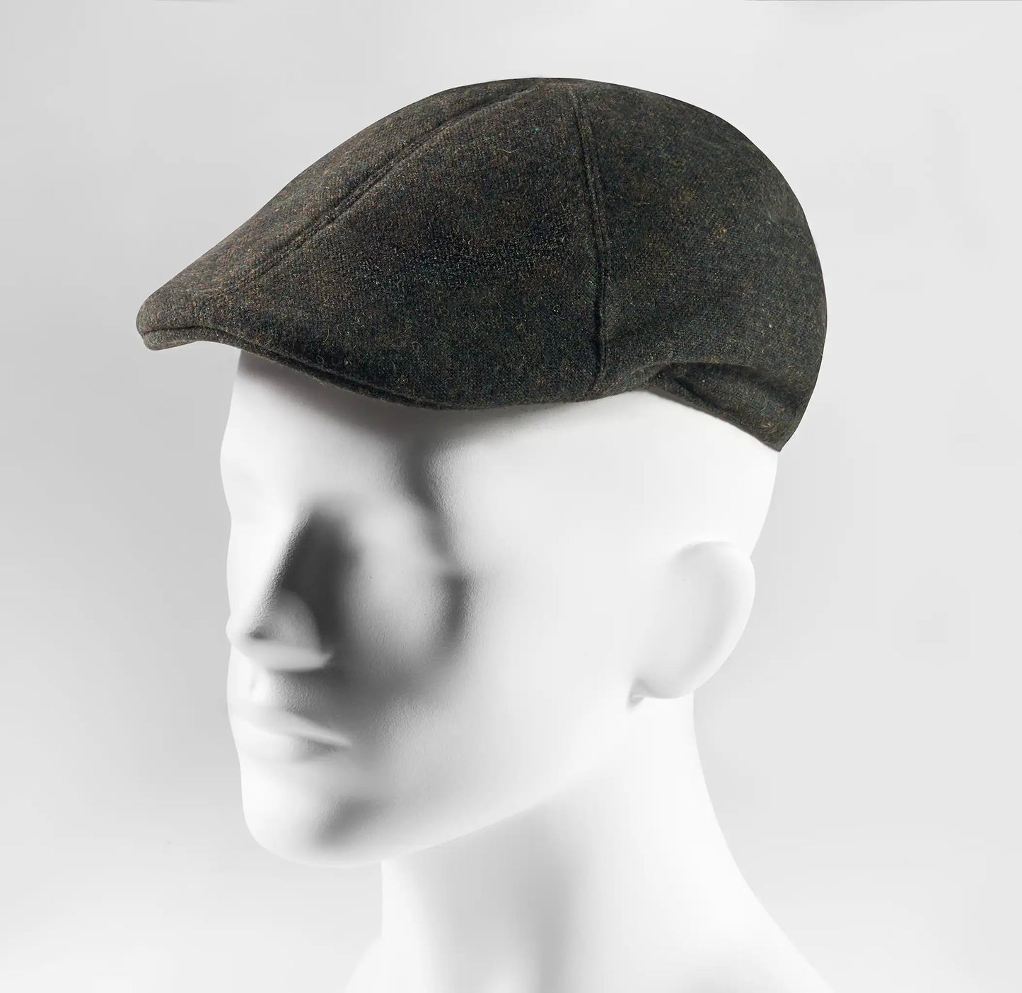 (Dunkelgrün) Schiebermütze Herren Tweed Flat Cap – Seitenansicht auf Mannequin