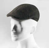 (Dunkelgrün) Schiebermütze Herren Tweed Flat Cap – Seitenansicht auf Mannequin